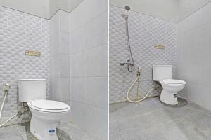 Ett badrum på Super OYO 90767 Gm Guest House