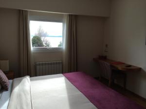 Postel nebo postele na pokoji v ubytování NBH Nativo Boutique Hotel