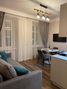 Μια τηλεόραση ή/και κέντρο ψυχαγωγίας στο Von Cruss apartments in Lviv