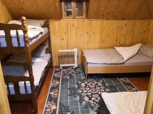 מיטה או מיטות בחדר ב-Vikendica Ajla