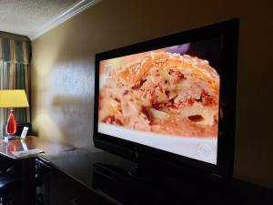 TV a/nebo společenská místnost v ubytování Extend-a-Suites - Extended Stay, I-40 Amarillo West