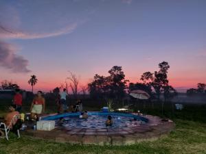 The swimming pool at or close to Chacra mita í