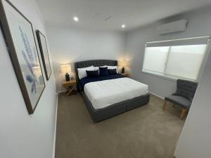 A bed or beds in a room at House on Argent Street