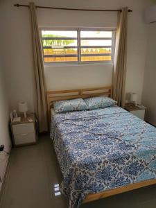 מיטה או מיטות בחדר ב-Maison chaleureuse avec Jacuzzi !