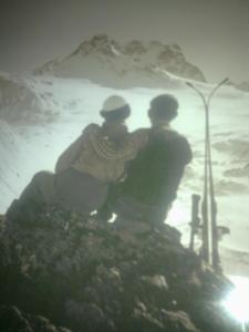 two people sitting on top of a mountain at Nilsiä city, Tahko lähellä, 80 m2, include x 2 Ski Pass in Tahkovuori