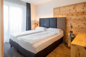Postel nebo postele na pokoji v ubytování Hotel Fontanella
