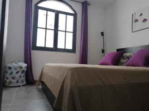 A bed or beds in a room at Amazing View Holiday Home near of the sea