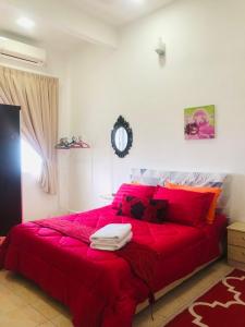 Giường trong phòng chung tại Galleria Homestay Islamic Alor Setar