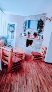 Televiisor ja/või meelelahutuskeskus majutusasutuses Borjomi Makvala's Guest House