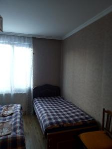 Letto o letti in una camera di Guest House Sunset