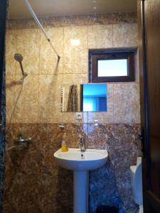 Bagno di Guest House Sunset