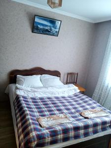 Letto o letti in una camera di Guest House Sunset