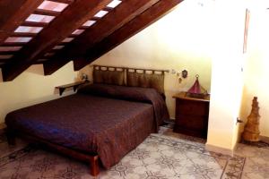 Ein Bett oder Betten in einem Zimmer der Unterkunft Casa Claudia