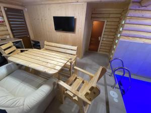 TV a/nebo společenská místnost v ubytování Zorianyy Guest House
