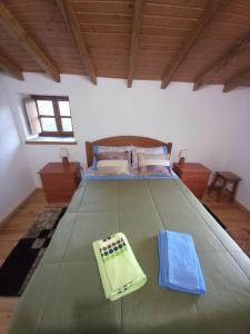 Ένα ή περισσότερα κρεβάτια σε δωμάτιο στο Casa da Esperança