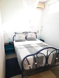 Postel nebo postele na pokoji v ubytování Chez Lilise 3