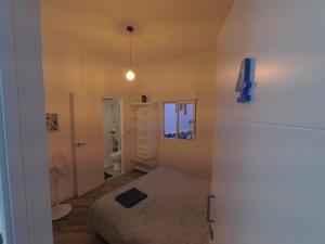 Baðherbergi á Room with Private Bathroom - Vivienda Vacacional Out of Blue