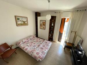A bed or beds in a room at Casa Jolanda