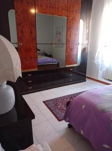 A bed or beds in a room at B&B Angels