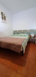 A bed or beds in a room at Reus y MAr Salou