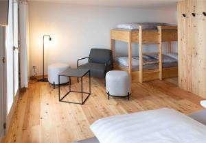 Ein Bett oder Betten in einem Zimmer der Unterkunft Hotel Tödiblick