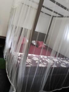 Letto o letti in una camera di Rainforest River Bay