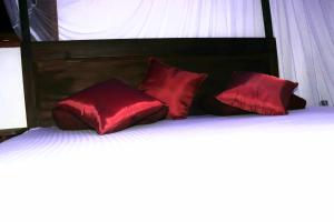 Letto o letti in una camera di Rainforest River Bay
