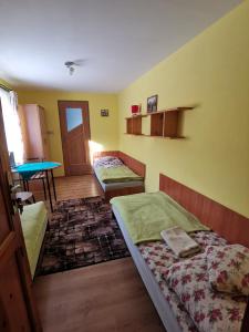Posteľ alebo postele v izbe v ubytovaní Pokoje u Arka + 20 fotografií