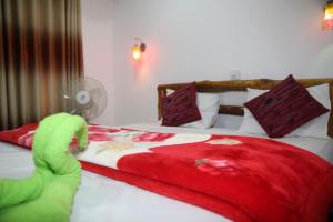 Кровать или кровати в номере Misty Mount Resort