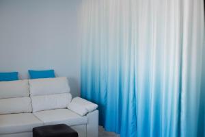 A seating area at Apartamento Séptimo cielo primera línea de mar