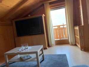 Televiisor ja/või meelelahutuskeskus majutusasutuses Appartement Birkheim