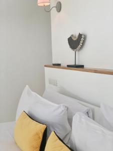 Letto o letti in una camera di PUNTA POPY Boutique HOTEL