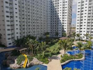 an aerial view of a resort with tall buildings at SHELL RESIDENCE c4 shortwalk Mall of Asia near airport in Manila