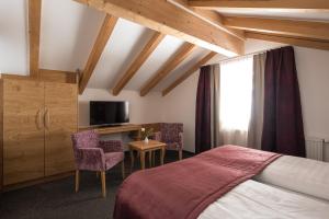 Postel nebo postele na pokoji v ubytování Hotel Seespitz
