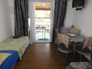 En eller flere senge i et værelse på Apartmani Tognon + 58 billeder