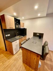 Una cocina o cocineta en Charmant studio cocooning, idéalement situé