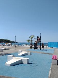 Swimmingpoolen hos eller tæt på Apartmani Tognon