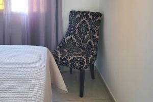 Posezení v ubytování Linda, cerca de todo, parqueo, patio, netflix