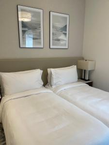 Postel nebo postele na pokoji v ubytování Address Beach Resort Residence Fujairah