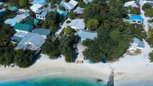 an aerial view of a resort with a beach at Summer Vibes Beach Front in Rasdu
