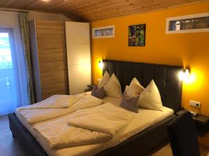 Postel nebo postele na pokoji v ubytování Schlossnerhof