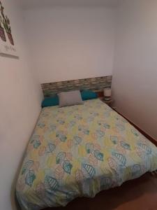 A bed or beds in a room at Reus y MAr Salou