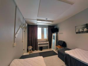 Postel nebo postele na pokoji v ubytování Guest House Vanttaus
