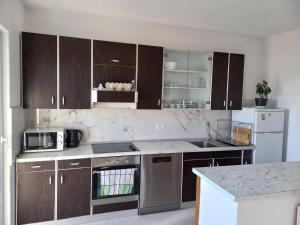Kuchyň nebo kuchyňský kout v ubytování Apartman Marica