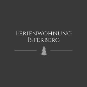a logo with a christmas tree in the middle at Ferienwohnung ISTERBERG in Isterberg
