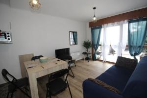 TV a/nebo společenská místnost v ubytování Superbe terrasse, rénové, WIFI