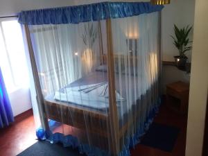 Postel nebo postele na pokoji v ubytování Gasthaus Langeoog
