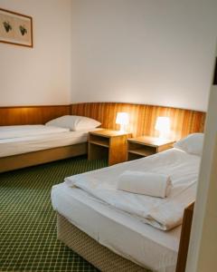 Rúm í herbergi á Hotel Am Sachsengang