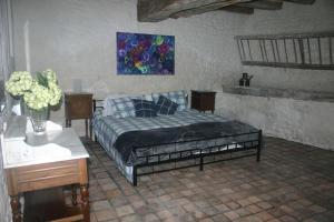 Postel nebo postele na pokoji v ubytování L'Ancienne Cave + 37 fotografií