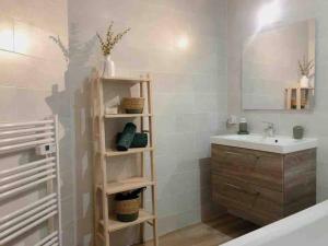 Et badeværelse på Appartement, centre ville AIGUILLON